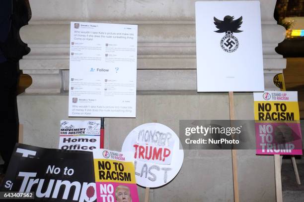 Placards lay in Parliament Square as thousands rally against US president Donald Trump's state visit to the UK on February 20, 2017 in London,...