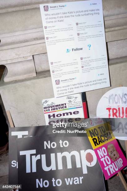 Placards lay in Parliament Square as thousands rally against US president Donald Trump's state visit to the UK on February 20, 2017 in London,...