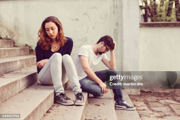 couple unhappiness - teenage couple stock pictures, royalty-free photos & images