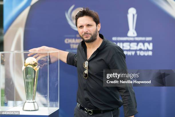 Shahid Afridi poses with the Champions Trophy at the ICC cricket Academy on February 21, 2017 in Dubai, United Arab Emirates.