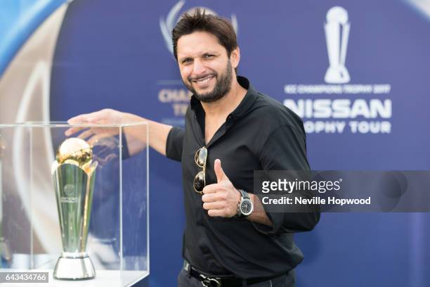 Shahid Afridi poses with the Champions Trophy at the ICC cricket Academy on February 21, 2017 in Dubai, United Arab Emirates.