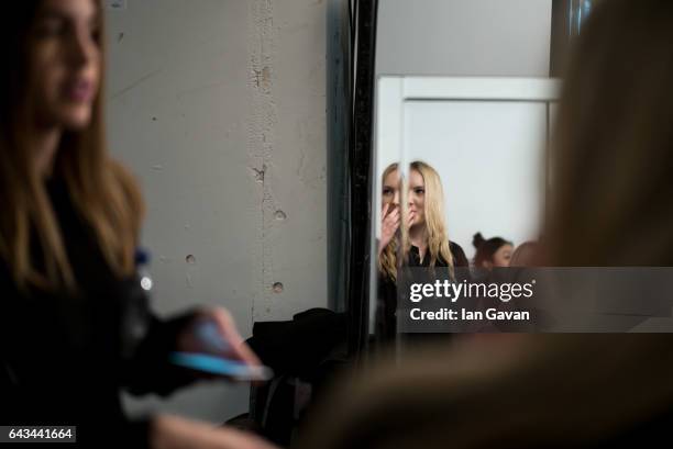 Model backstage at the XIAO LI show during the London Fashion Week February 2017 collections on February 21, 2017 in London, England.