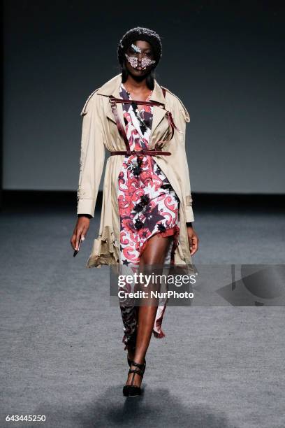 Model walks the runway at the AMAI RODRIGUEZ show during the EGO Mercedes-Benz Madrid Fashion Week Autumn/Winter 2017/2018 at IFEMA on February 21,...