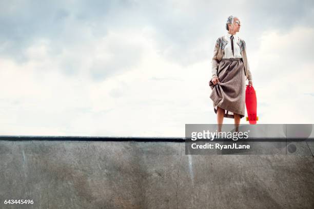 courageous grandma skateboarding - humor stock pictures, royalty-free photos & images