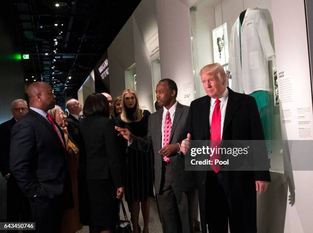 President Donald Trump, joined by Dr. Ben Carson Ivanka Trump and Sen. Tom Scott, R-S.C., visit the Ben Carson exhibit as they tour the Smithsonian...