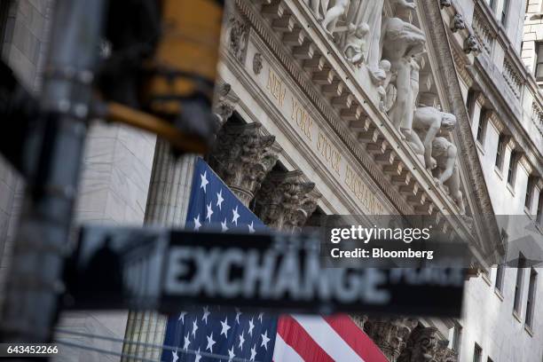 An Exchange Place street sign is displayed in front of the New York Stock Exchange in New York, U.S., on Tuesday, Feb. 21, 2017. U.S. Stocks rose to...