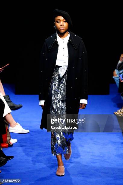 Model walks the runway at the OSMAN show during the London Fashion Week February 2017 collections on February 20, 2017 in London, England.