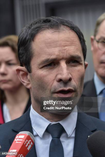 French presidential election candidate for the left-wing French Socialist party Benoit Hamon answers to the press during a visit to the Memorial de...