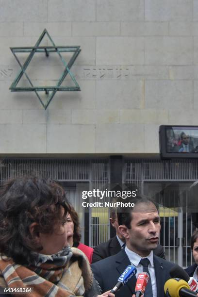 French presidential election candidate for the left-wing French Socialist party Benoit Hamon answers to the press during a visit to the Memorial de...