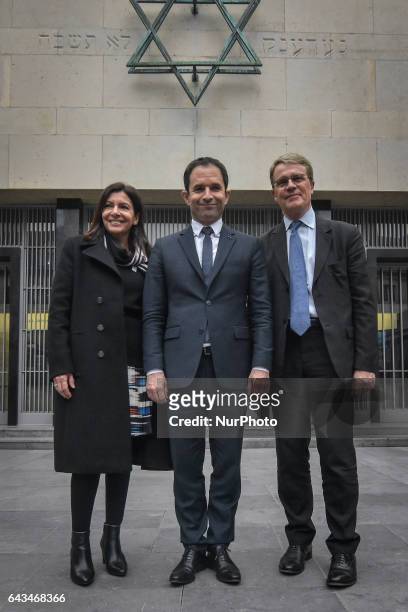 Mayor of Paris Anne Hidalgo and French presidential election candidate for the left-wing French Socialist party Benoit Hamon pose for photos during a...