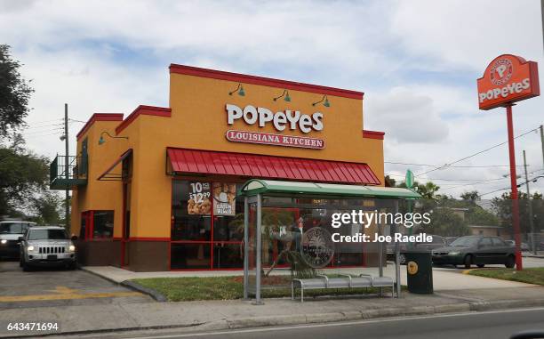Popeyes restaurant is seen on February 21, 2017 in Miami, Florida. Burger King and Tim Horton's owner Restaurant Brands International has announced...