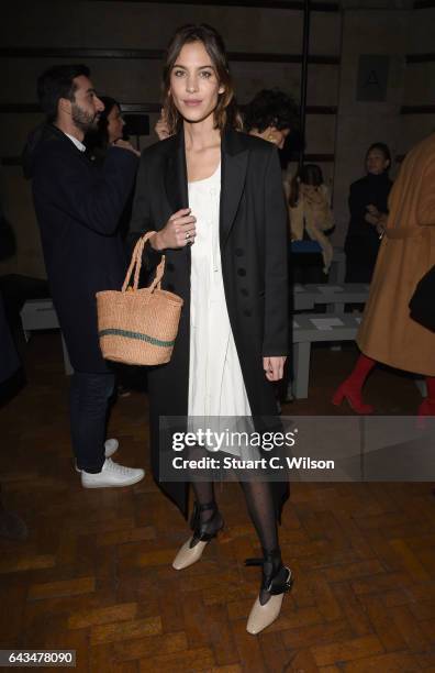 Alexa Chung attends the Emilia Wickstead AW17 catwalk show at The College on February 18, 2017 in London, England.