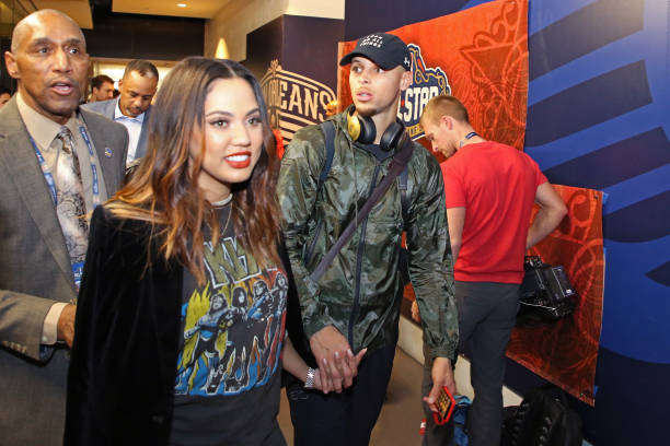 Stephen Curry of the Western Conference All-Star Team exits the locker room with his wife, Ayesha Curry during the NBA All-Star Game as part of the...