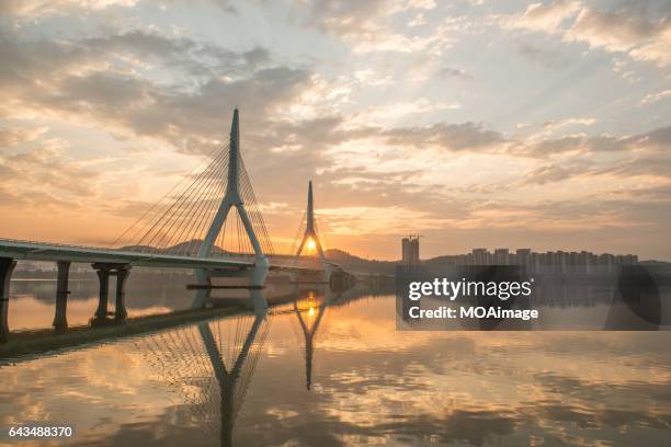 mianyang bridge at sunset in sichuan - mianyang stock pictures, royalty-free photos & images