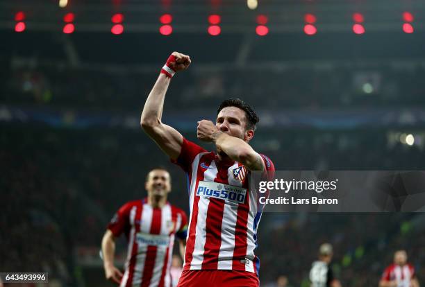 Saul Niguez of Atletico celebrates after he scores the opening goal during the UEFA Champions League Round of 16 first leg match between Bayer...