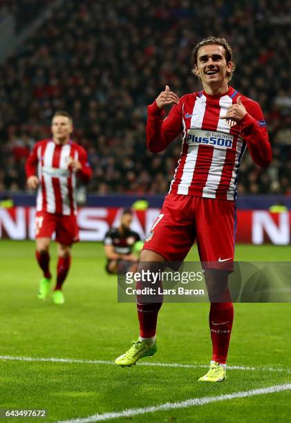 Antoine Griezmann of Atletico celebrates after he scores the 2nd goal during the UEFA Champions League Round of 16 first leg match between Bayer...