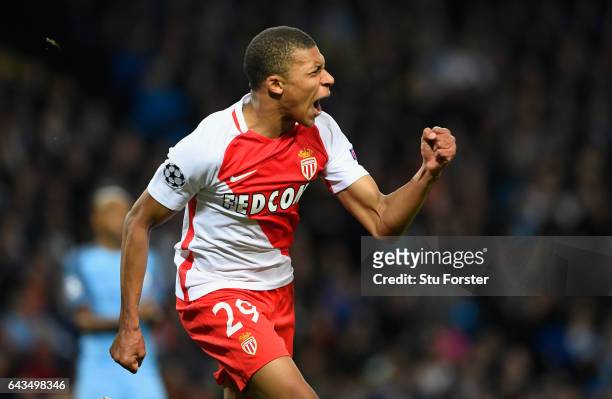Kylian Mbappe of AS Monaco celebrates as he scores their second goal during the UEFA Champions League Round of 16 first leg match between Manchester...