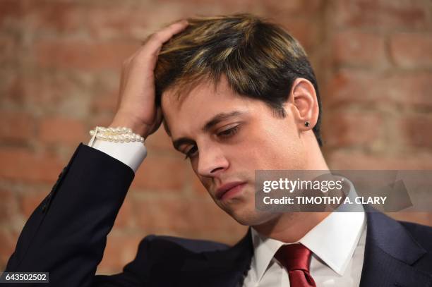 Milo Yiannopoulos holds a press conference in New York on February 21, 2017. - The conservative firebrand Milo Yiannopoulos resigned Tuesday from the...