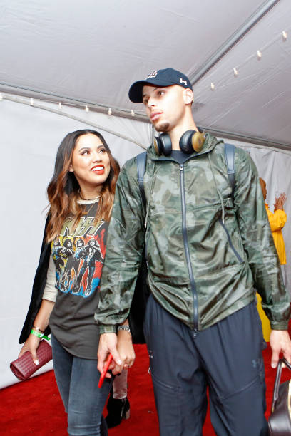 Stephen Curry of the Western Conference All-Star Team exits the arena with his wife, Ayesha Curry after the NBA All-Star Game as part of the 2017 NBA...