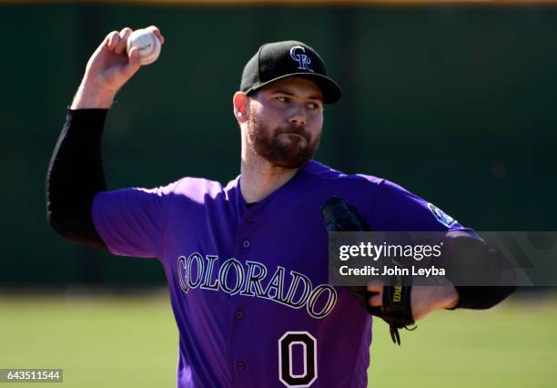 Colorado Rockies Adam Ottavino delivers a pitch during Spring Training practice February 21, 2017 at Salt River Fields at Talking Stick.