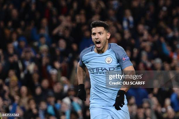 Manchester City's Argentinian striker Sergio Aguero celebrates scoring their second goal during the UEFA Champions League Round of 16 first-leg...