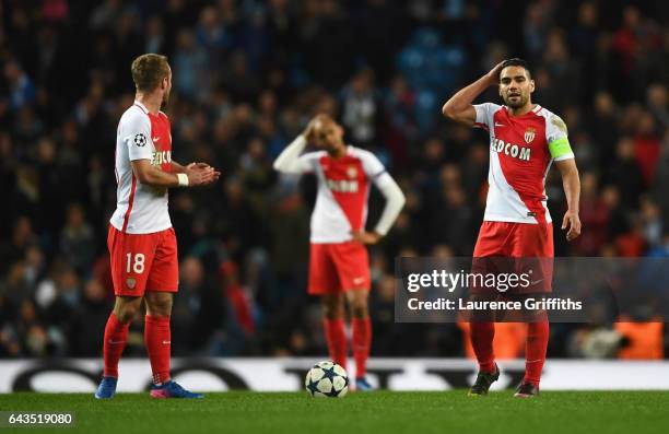 Valere Germain and Radamel Falcao Garcia of AS Monaco look despondent during the UEFA Champions League Round of 16 first leg match between Manchester...