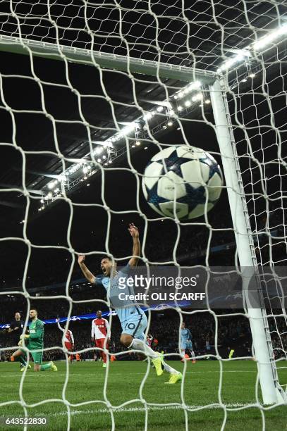 Manchester City's Argentinian striker Sergio Aguero celebrates as the ball goes in the net for their fifth goal scored by Manchester City's German...