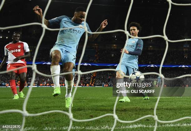 Manchester City's German midfielder Leroy Sane scores their fifth goal during the UEFA Champions League Round of 16 first-leg football match between...