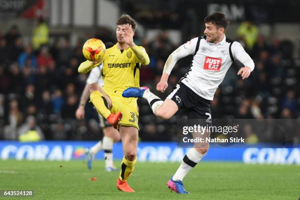 Derby, ENGLANDDavid Nugent of Derby County and Luke Murphy of Burton Albion in action during the Sky Bet Championship match between Derby County and...