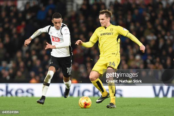 Derby, ENGLANDLasse Vigen Christensen of Burton Albion and Tom Ince of Derby County in action during the Sky Bet Championship match between Derby...