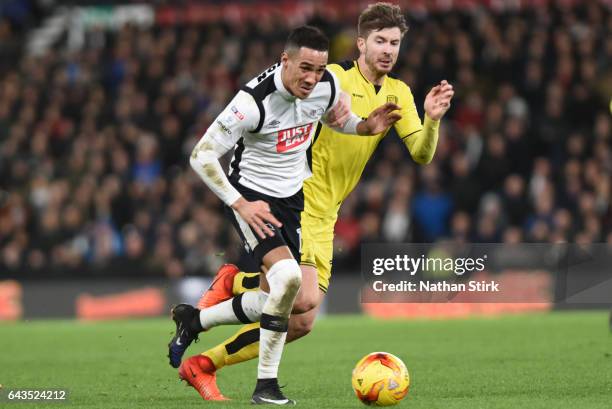 Derby, ENGLANDTom Ince of Derby County and Luke Murphy of Burton Albion in action during the Sky Bet Championship match between Derby County and...