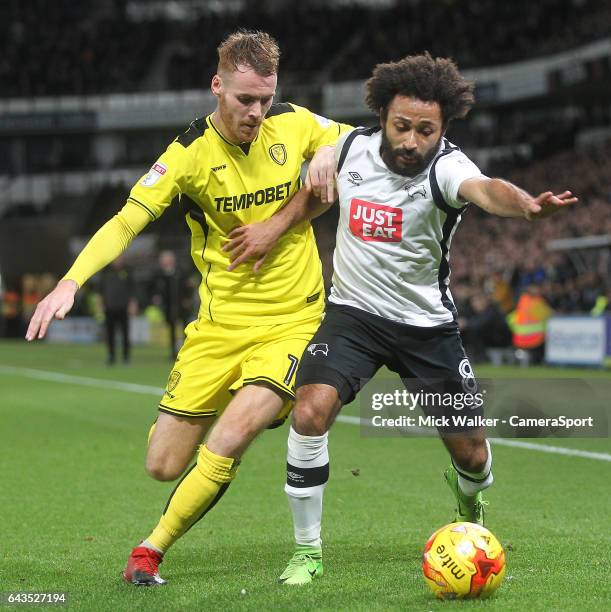 Derby County's Ikechi Anya battles with Burton Albion's Tom Naylor during the Sky Bet Championship match between Derby County and Burton Albion at...