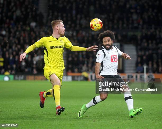 Derby County's Ikechi Anya in action with Burton Albion's Tom Naylor during the Sky Bet Championship match between Derby County and Burton Albion at...