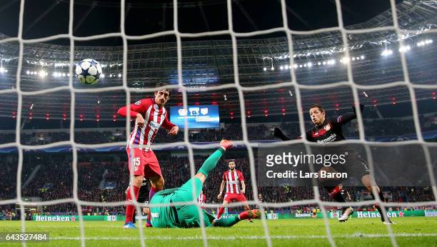 Stefan Savic of Atletico scores an own goal during the UEFA Champions League Round of 16 first leg match between Bayer Leverkusen and Club Atletico...