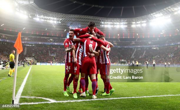 Saul Niguez of Atletico celebrates after he scores the opening goal during the UEFA Champions League Round of 16 first leg match between Bayer...