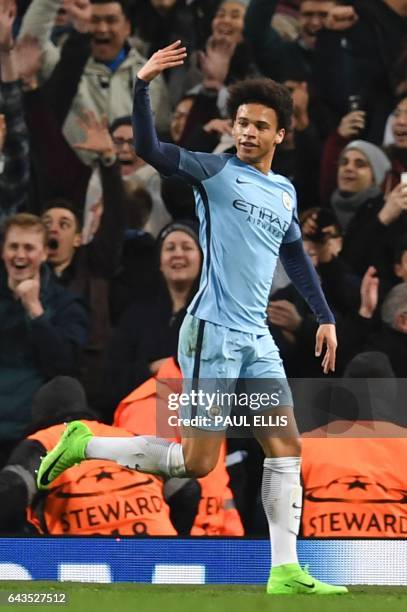 Manchester City's German midfielder Leroy Sane celebrates scoring their fifth goal during the UEFA Champions League Round of 16 first-leg football...