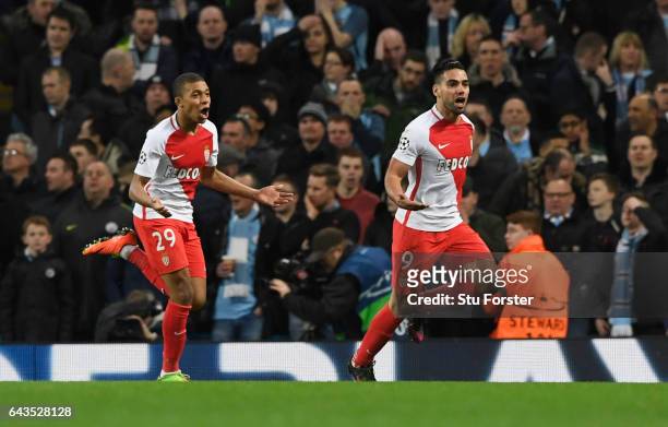 Radamel Falcao Garcia of AS Monaco celebrates with Kylian Mbappe as he scores their third goal during the UEFA Champions League Round of 16 first leg...