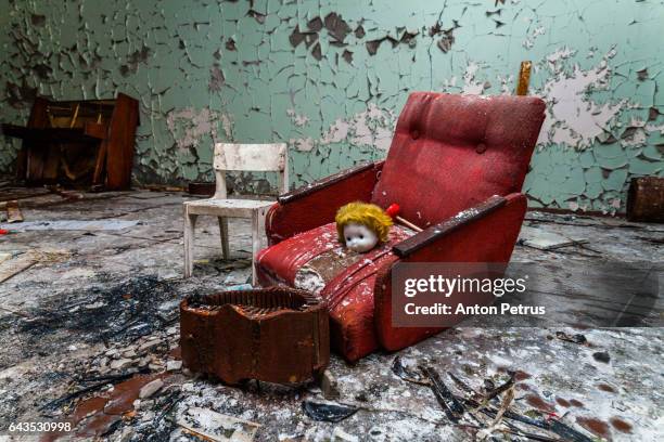 armchair in a kindergarten in the chernobyl zone. prypiat, ukraine - chernobyl ストックフォトと画像