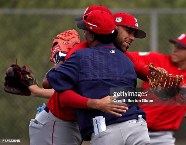 Pedro Martinez, Special Assistant to the President of Baseball Operations, and Boston Red Sox starting pitcher David Price embrace as Martinez made...
