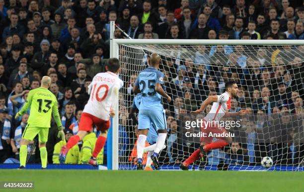 Monaco's striker Radamel Falcao celebrates scoring their third goal against Manchester City during the UEFA Champions League Round of 16 soccer match...