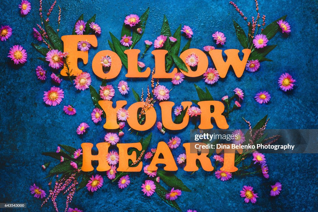 Inspirational quote with purple flowers