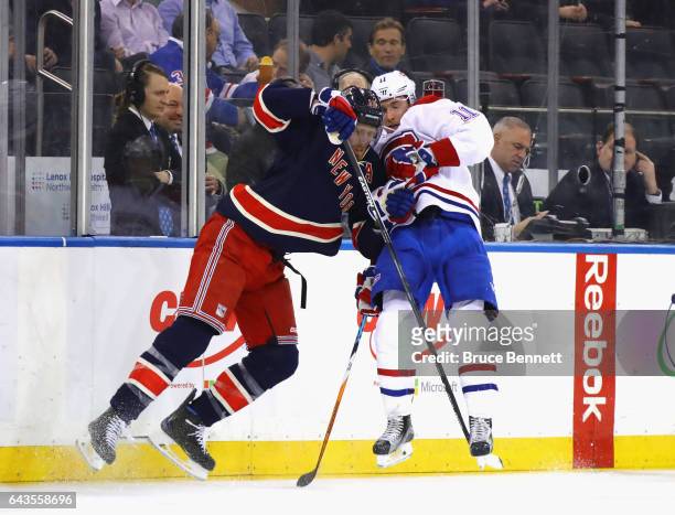 Marc Staal of the New York Rangers steps into Brendan Gallagher of the Montreal Canadiens during the first period at Madison Square Garden on...