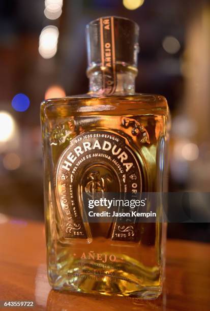 View of a Herradura Anejo bottle at Tequila Herradura premieres 'Luck Is Earned' on National Margarita Day eve featuring a live performance and...