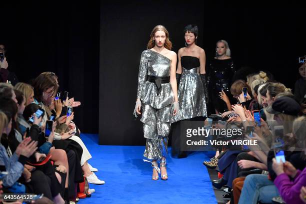 Model walks the runway at the OSMAN Ready to Wear Fall Winter 2017-2018 fashion show during the London Fashion Week February 2017 collections on...