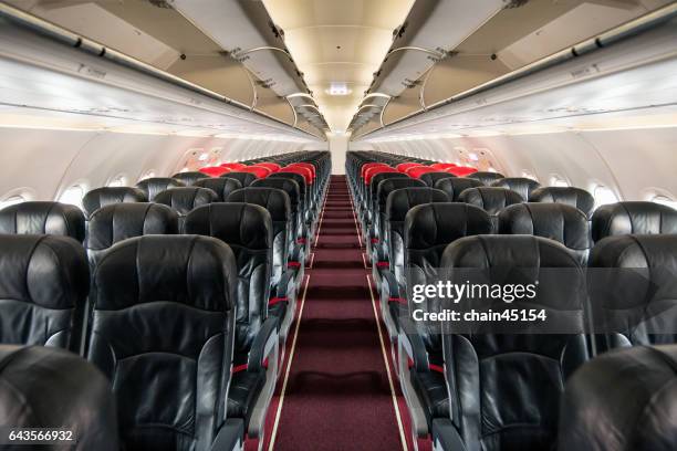 airplane seat for business travel transportation. - aisle seat airline stock-fotos und bilder