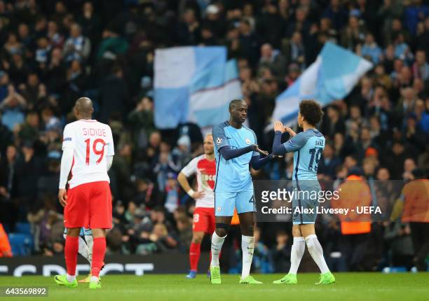 Yaya Toure and Leroy Sane of Manchester City FC celebrate after the UEFA Champions League Round of 16 first leg match between Manchester City FC and...