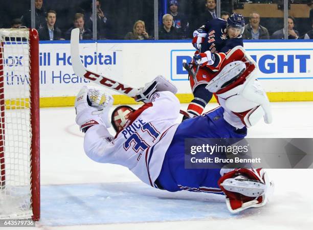 Carey Price of the Montreal Canadiens makes the diving save in the closing seconds of overtime against J.T. Miller of the New York Rangers at Madison...