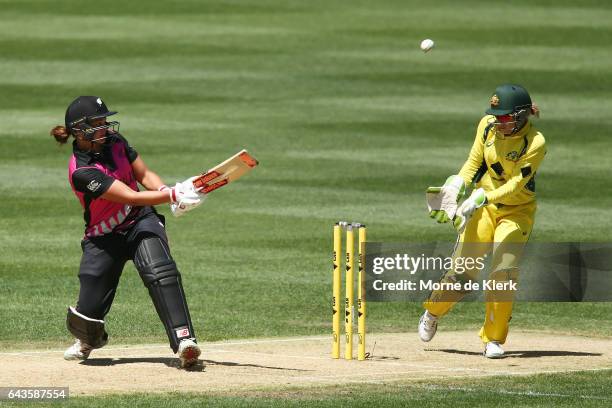 Suzie Bates of New Zealand plays a ramp shot over Alyssa Healy of Australia during the Women's Twenty20 International match between the Australia...