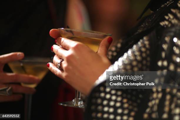 Guest holds a cocktail glass during The 19th CDGA with Presenting Sponsor LACOSTE at The Beverly Hilton Hotel on February 21, 2017 in Beverly Hills,...