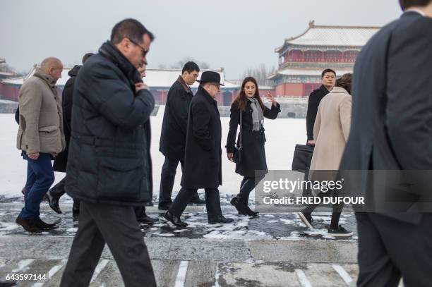 French Prime Minister Bernard Cazeneuve and his delegation visit the Forbidden City in Beijing on February 22, 2017. Cazeneuve is on a three-day...